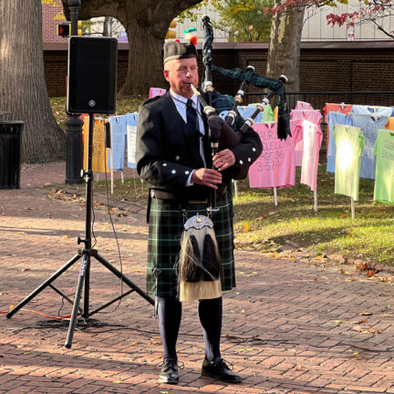 Bagpiper at Memorial to the Lost.