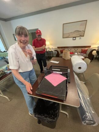Two people with The Pan African Sisterhood Health Initiative.