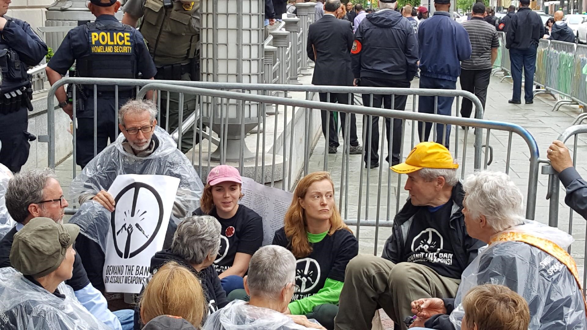 Philadelphia Yearly Meeting Friends support arrestees at Demand the Ban action outside Senator Toomey’s office in Philadelphia