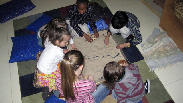 Young Kids playing in a sandbox