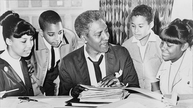 Bayard Rustin & Students before a demonstration