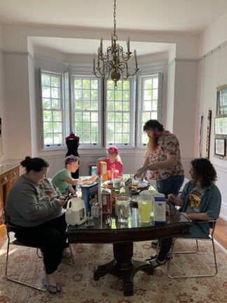 Young Adult Friends enjoy breakfast and bonding