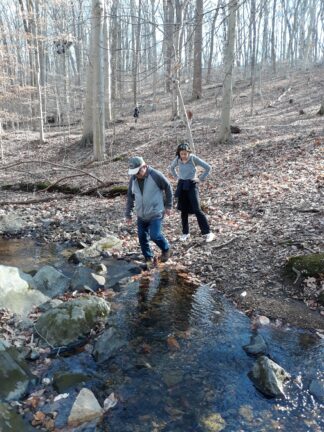 George enjoying hiking trail with granddaughter 