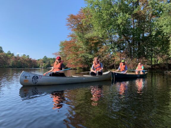 Friends Canoeing on a beautiful Fall Day